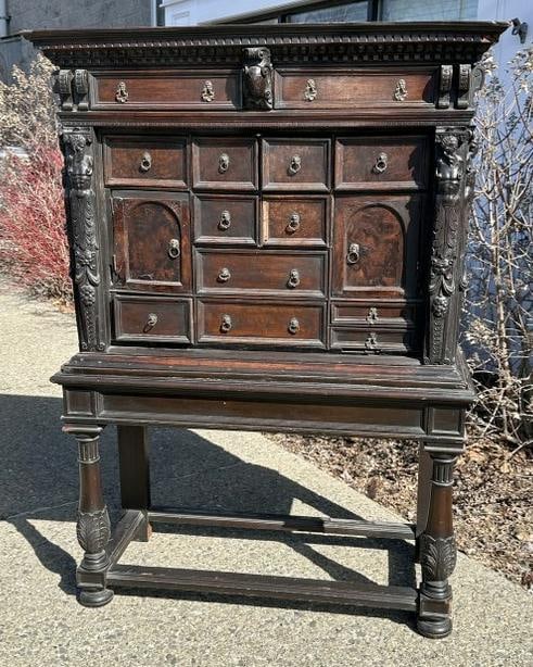 Early Continental multi drawer 2 part chest with carved figures on front & sides, looks like burl on (1 of 8)