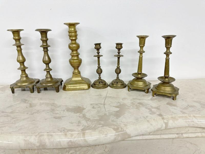 Lot of 7 brass candlesticks including 3 pair, tallest measures 10" high… (1 of 1)