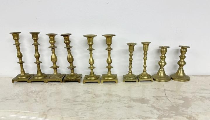 5 pairs of brass candlesticks in nice estate condition, tallest pair measures 8" high (1 of 4)