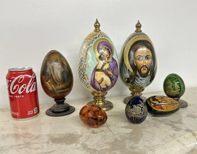 Russian egg lot including 2- 9" high hand painted porcelain eggs on brass bases, other glass and (1 of 9)