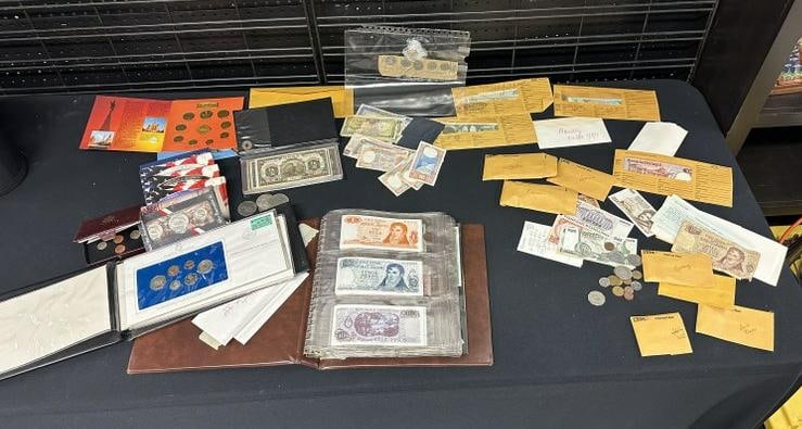 Estate lot as found mostly foreign coins and paper money, some in envelopes with countries marked on (1 of 19)