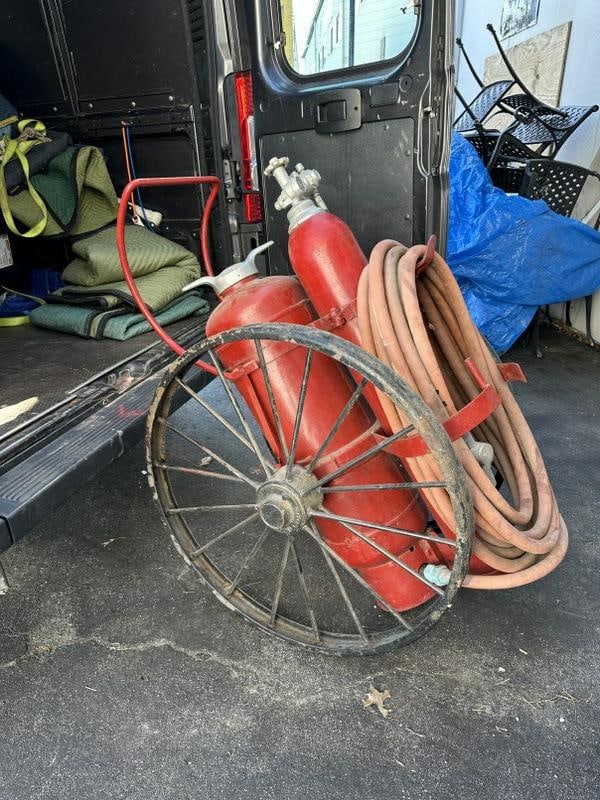 ANSUL Firefighters cart with tanks ( Dry Chemical ), 2 large wheels, from Hudson Valley estate, used: ANSUL Firefighters cart with tanks ( Dry Chemical ), 2 large wheels, from Hudson Valley estate, used as a prop in game room setting. Measures 56" high to top of handle x 25" wide across the wheels.