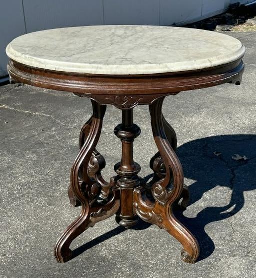 Victorian oval top marble table, structurally sound, old dark finish, measures 29" W x 29" D x 28" (1 of 5)
