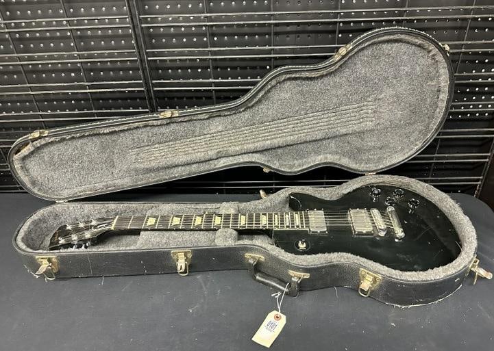 Vintage Gibson Les Paul Studio model guitar, from local estate, his son was a musician and the (1 of 14)