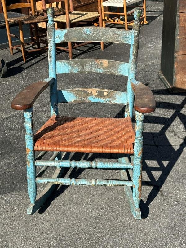 Old country rocking chair w/replaced rush seat in old blue paint, structurally sound.: Old country rocking chair w/replaced rush seat in old blue paint, structurally sound.