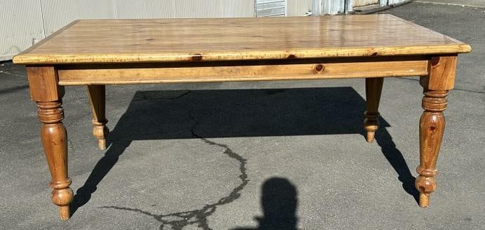 Contemporary pine farm table, structurally sound, measures 72" W x 42" D x 30.5" H. (1 of 8)