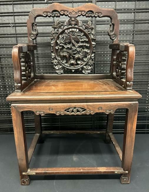 Carved Asian hardwood armchair, intricate carvings on backand side, measures 24" W x 20" D x 39" H.: Carved Asian hardwood armchair, intricate carvings on backand side, measures 24" W x 20" D x 39" H.
