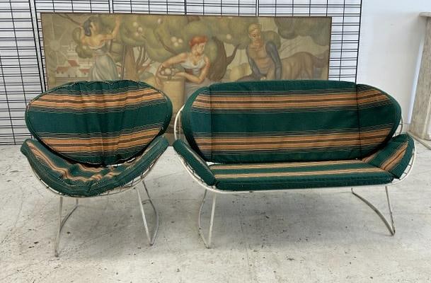 Mid century iron loveseat and chair with cushions, loveseat measures 55" W x 28" D x 29" H, chair: Mid century iron loveseat and chair with cushions, loveseat measures 55" W x 28" D x 29" H, chair measures 30" W x 28" D x29" H.