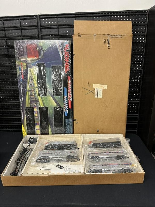 LIONEL TRAINS SILVER SPIKE set in original box and mailing box too. Played with but taken care of, (1 of 7)