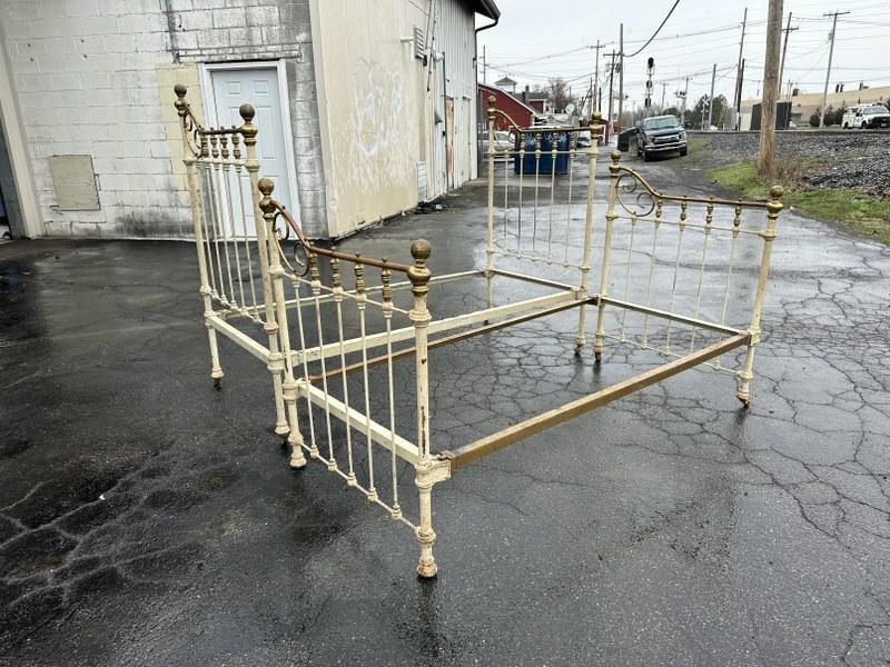 (2) Victorian iron and brass single beds or daybeds, not quite matching, one a little taller than: (2) Victorian iron and brass single beds or daybeds, not quite matching, one a little taller than the other. From old estate in Hudson Valley. One measures 79" long x 36" wide x 61" high and the other