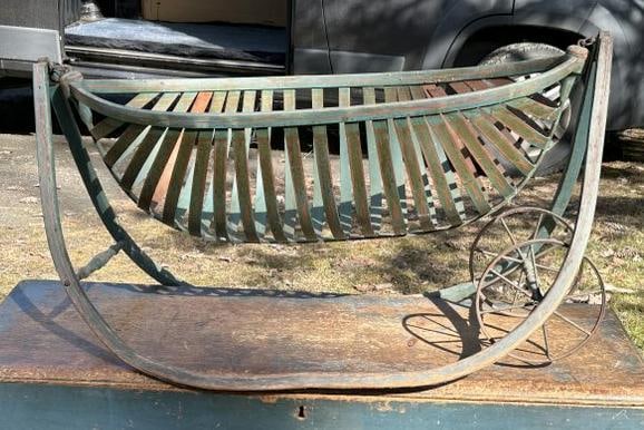 Rare FORD JOHNSON & Co. cradle with wheels, makers stamp still intact ( a few slats have been: Rare FORD JOHNSON & Co. cradle with wheels, makers stamp still intact ( a few slats have been expertly replaced. Found in Hudson Valley estate, retains original paint, and stenciling. Measures 42" lon