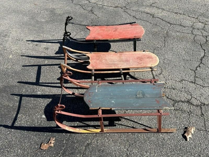 (3) semi vintage kids sleds, used as props in a house….just as we found them.: (3) semi vintage kids sleds, used as props in a house….just as we found them.