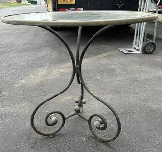 Decorative round glass top table with wonderful form base, from local estate. Top measures 30.5": Decorative round glass top table with wonderful form base, from local estate. Top measures 30.5" across x 29" high. Nice worn patina….