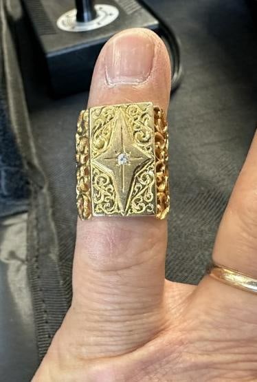 14K ladies fancy ring with diamond chip in center, weighs 6.4 pennyweights. ( size 6.5 ). From local (1 of 6)