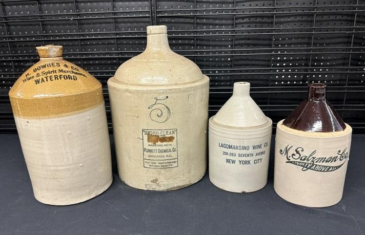 (4) stoneware jugs with advertising on fronts, largest is 5 gallons, a few nicks and small chips (1 of 7)