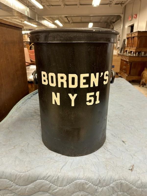 BORDENS NY 51 old milk can with lid, indented letters, older repaint, from local estate, used inside: BORDENS NY 51 old milk can with lid, indented letters, older repaint, from local estate, used inside as a prop. Measures 19.5" high, nice overall condition.