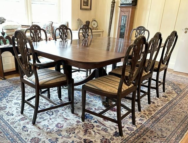 Circa 1920's pedestal base mahogany dining room table & 8 chairs, base has inlay on bottom, 1 leg (1 of 4)
