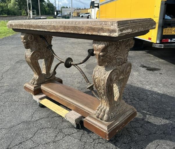 Contemporary console table w/rams on base, metal center post, made from composition, from Boston (1 of 3)