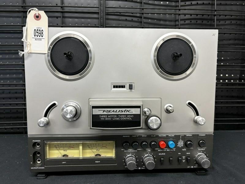 Vintage audio Realistic TR-3000 reel-to-reel tape deck. Serial number 27157 03. Unit has been (1 of 6)
