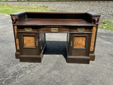 Nice old oak desk with rams heads on sides, was taken apart in storage in Boston, we loosely