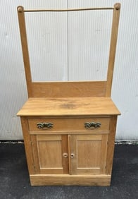 Circa 1900 oak washstand with towel bar, strucrually sound, from local estate, measures 52.25" high