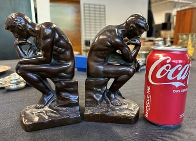 Pair 7" high white metal with bronze finish THINKER bookends, nice patina, nice clean condition. Has