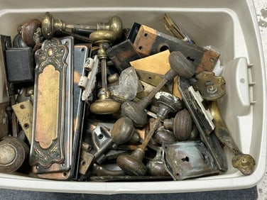 Big lot old hardware from estate in Boston, tub is filled with door knobs, handle plates, hinges,