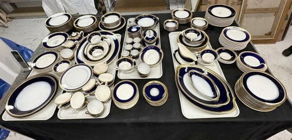 Big lot blue and white, with gold trim dishes and service pieces, all similar like patterns,