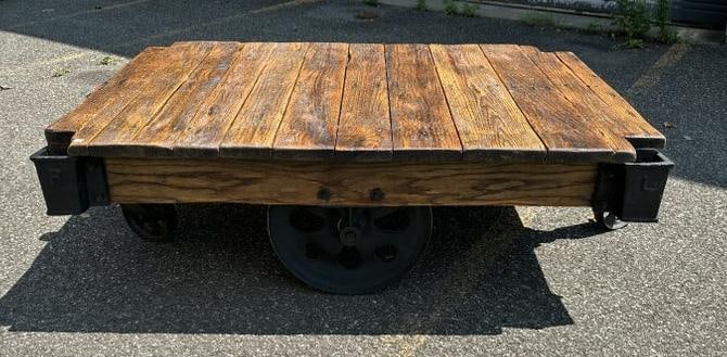 Industrial cart used as coffee table in country home, oak boards on top, Industrial wheels, nice (1 of 4)