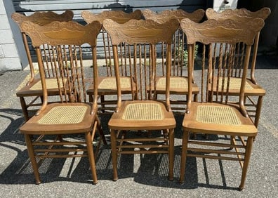(7) circa 1900 oak pressed back chairs with caned seats, in very nice estate condition, structurally