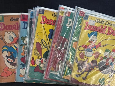 Lot of 13 Dell Walt Disney's Donald Duck 1950s-1960s. Lot includes #30-39, 43, 51, 73. Conditions