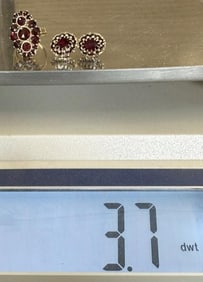 Ladies 14k garnet ring with pair of garnet earrings, from local estate, nice condition. Ring size is