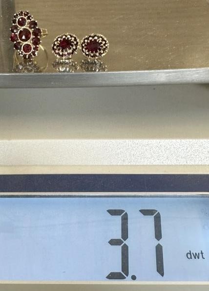 Ladies 14k garnet ring with pair of garnet earrings, from local estate, nice condition. Ring size is (1 of 5)