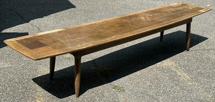Danish Modern coffee table, from local estate, kind of parque pattern top, wear to finish, measures: Danish Modern coffee table, from local estate, kind of parque pattern top, wear to finish, measures 13.75" high x 74.75" wide x 17" deep.