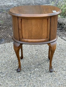 Nice diminutive 1920's walnut oval stand, clean condition, structurally sound, measures 23.75" high