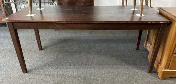 Contemporary work table or farm table, structurally sound, possibly birch, dark finish, some wear