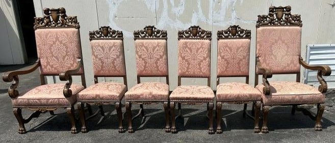 Set (6) circa 1900 heavily carved oak dining chairs, includes (2) armchairs with cherubs on top,