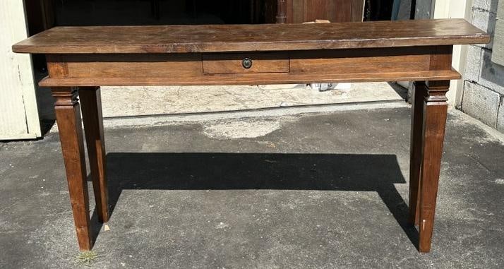 One drawer hardwood console table, structurally sound, nice form, from local estate. Measures 31": One drawer hardwood console table, structurally sound, nice form, from local estate. Measures 31" high x 60.5" wide x 16.5" deep. Good looking table.