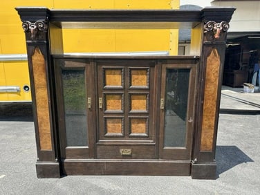 Nice oak bookcase with burl panels and carved rams heads on top, 2 doors, nice condition, from