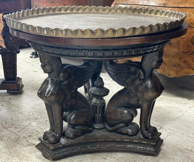Nice carved round table with Egyptian winged figures on base, and brass tray top, hardwood, dark (1 of 5)