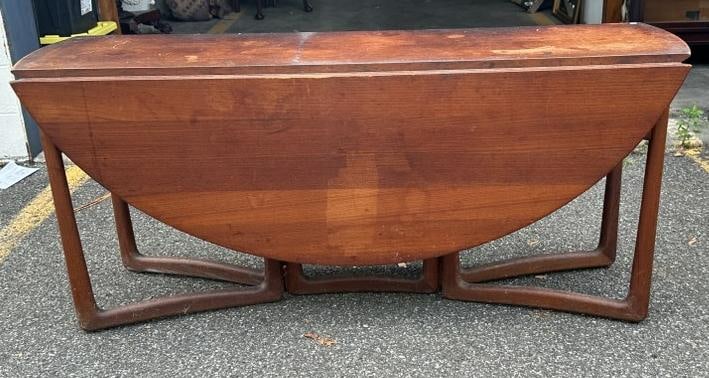 John Stuart (Made in Denmark ) teak Danish Modern swing leg deop leaf teak dining table, from Hudson (1 of 7)
