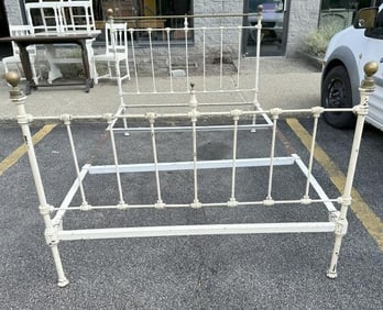 Full size painted white iron bed, missing brass rod from top of footboard, and brass finial balls