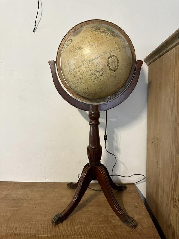 Mahogany illuminated globe on a stand, globe has some wear, just as we found it, measures 41" H. (1 of 4)