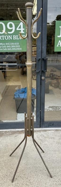 Old brass coat tree in nice overall estate condition. Measures 68" high, nice patina. Solid… (1 of 1)