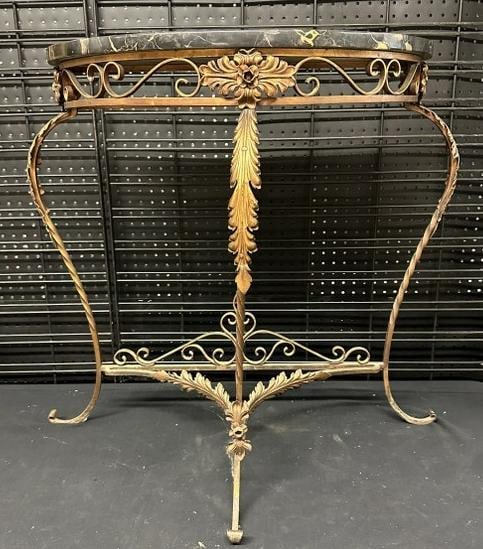 Wonderful decorative iron base console table with marble top, very nice estate condition. Measures (1 of 3)