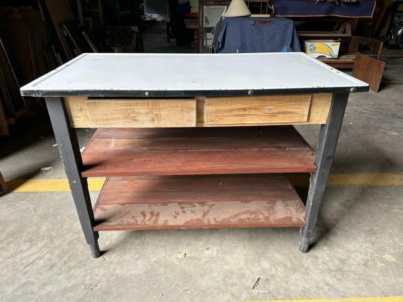 Porecelain top reworked counter work table, with 2 drawers. Measures 48" wide x 27" deep x 25" high. (1 of 2)