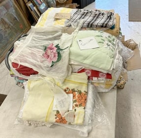 Misc. vintage lot textiles to include aprons, fabric &  tablecloths, cleand and ready to go, from