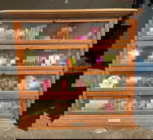 A N RUSSELL & SONS ILION, N.Y. circa 1900 oak ribbon cabinet, original condition, later ribbons