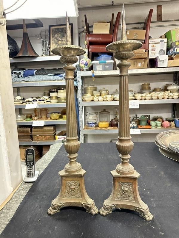 Pair brass 32" high candlesticks from Church, has 3 different details on base as pictured, with claw: Pair brass 32" high candlesticks from Church, has 3 different details on base as pictured, with claw feet, nice old patina, from Boston estate we are selling.