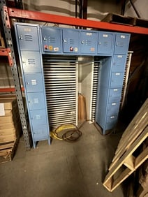 Metal 16 door storage locker, measures 78" high X 69" wide X 18" deep.